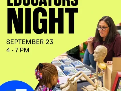 Educator speaking to a child at a table with anatomical models and educational materials. Bright yellow background.