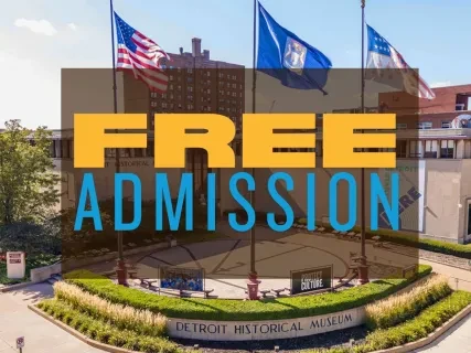 Flags and a building with text "Free Admission" overlaid.