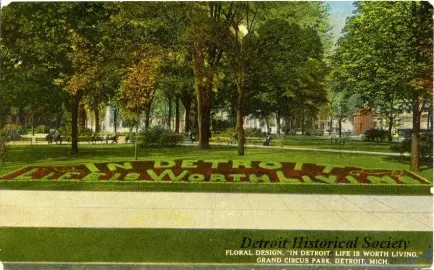 Postcard - Floral Design, "In Detroit, Life is Worth Living," Grand Circus Park, Detroit, Mich.