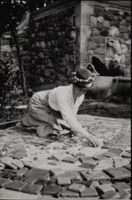 Negative, Film - Miss Perry at work with her tiles