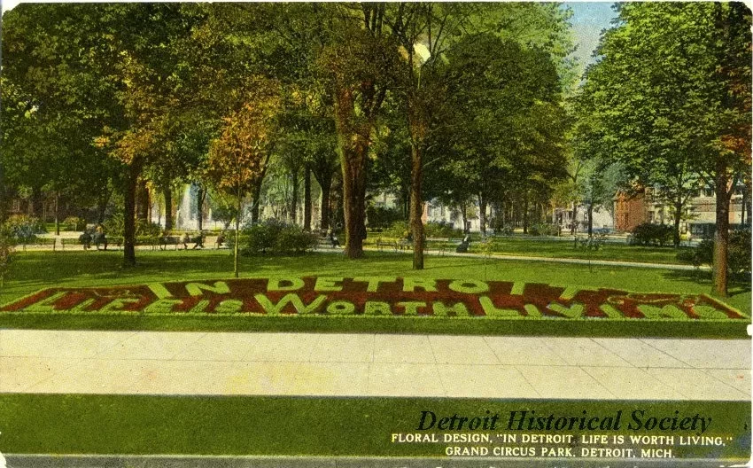 Postcard - Floral Design, "In Detroit, Life is Worth Living," Grand Circus Park, Detroit, Mich.