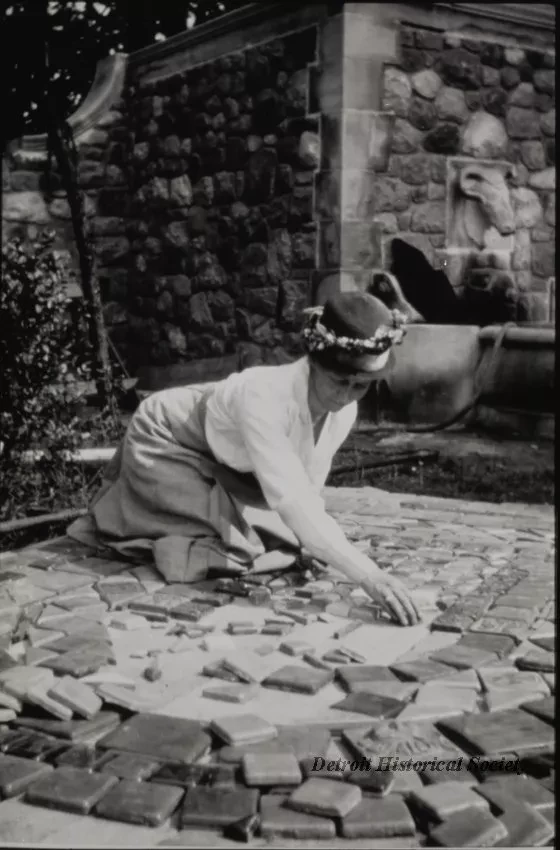 Negative, Film - Miss Perry at work with her tiles