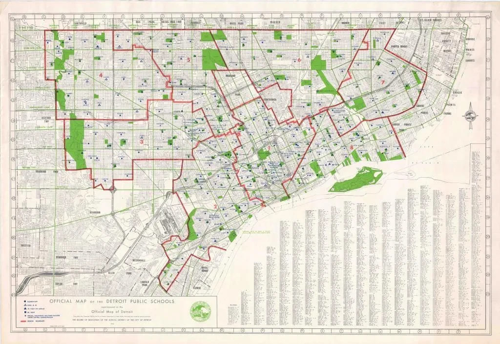 Toronto street map with red borders and green parks, featuring street names and grid layout.