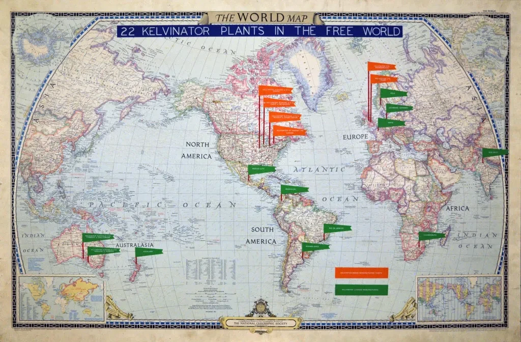 Antique world map with overlaid red and green flag markers in various countries.